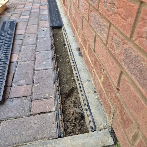 External drainage channel checked during a snagging inspection