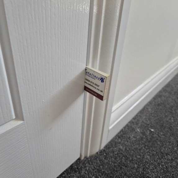 Door gap checked during a new-build inspection