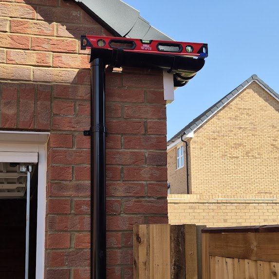 Guttering level checked during a snagging inspection