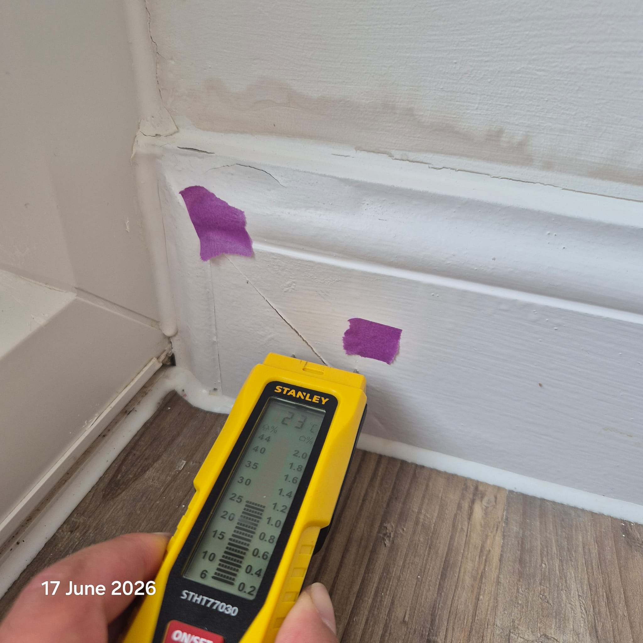 Moisture meter reading recorded during inspection