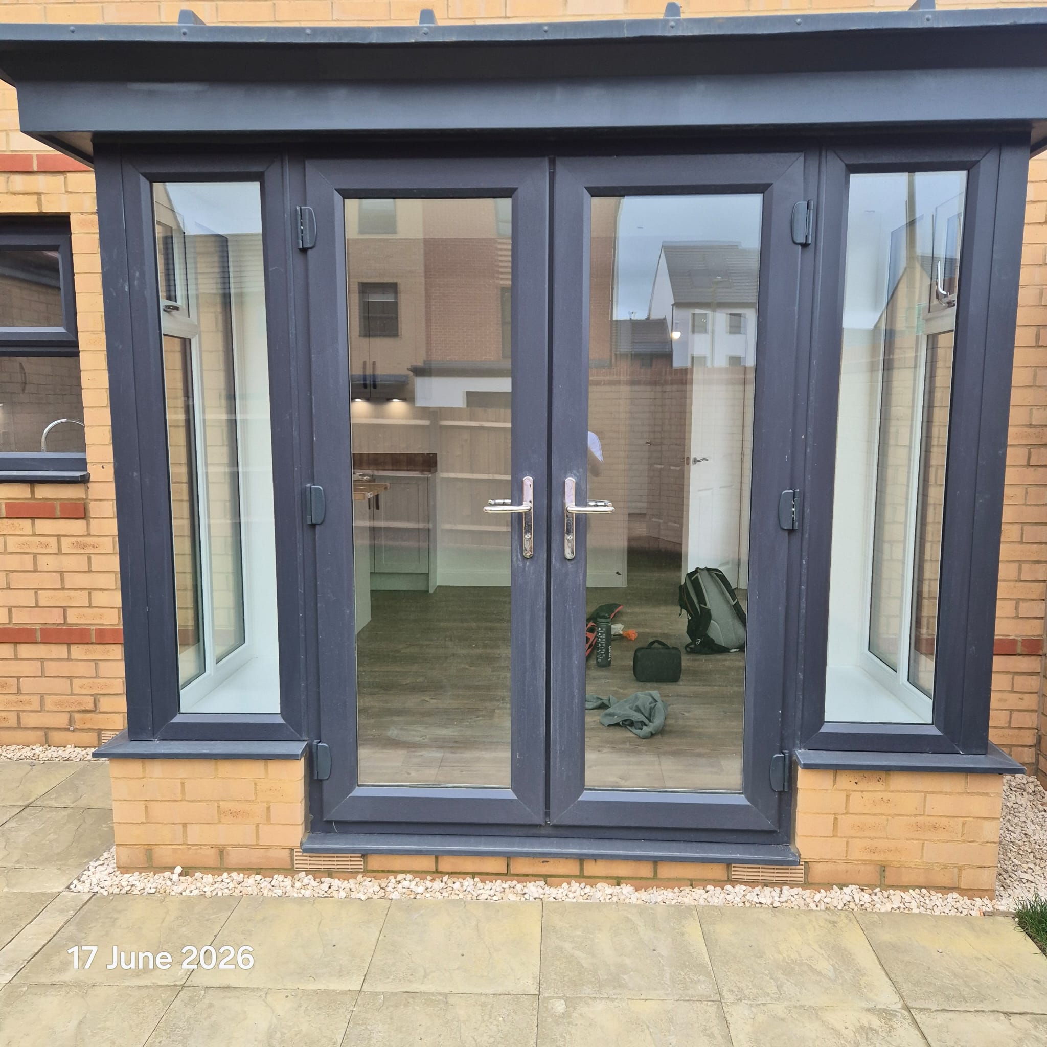 French doors and external area checked during a pre-completion inspection
